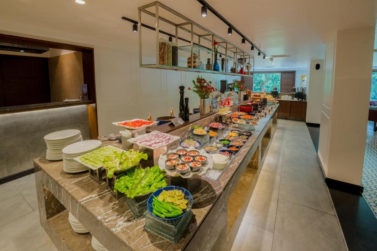 a buffet line with many different types of food at Southern Star,Mysore in Mysore