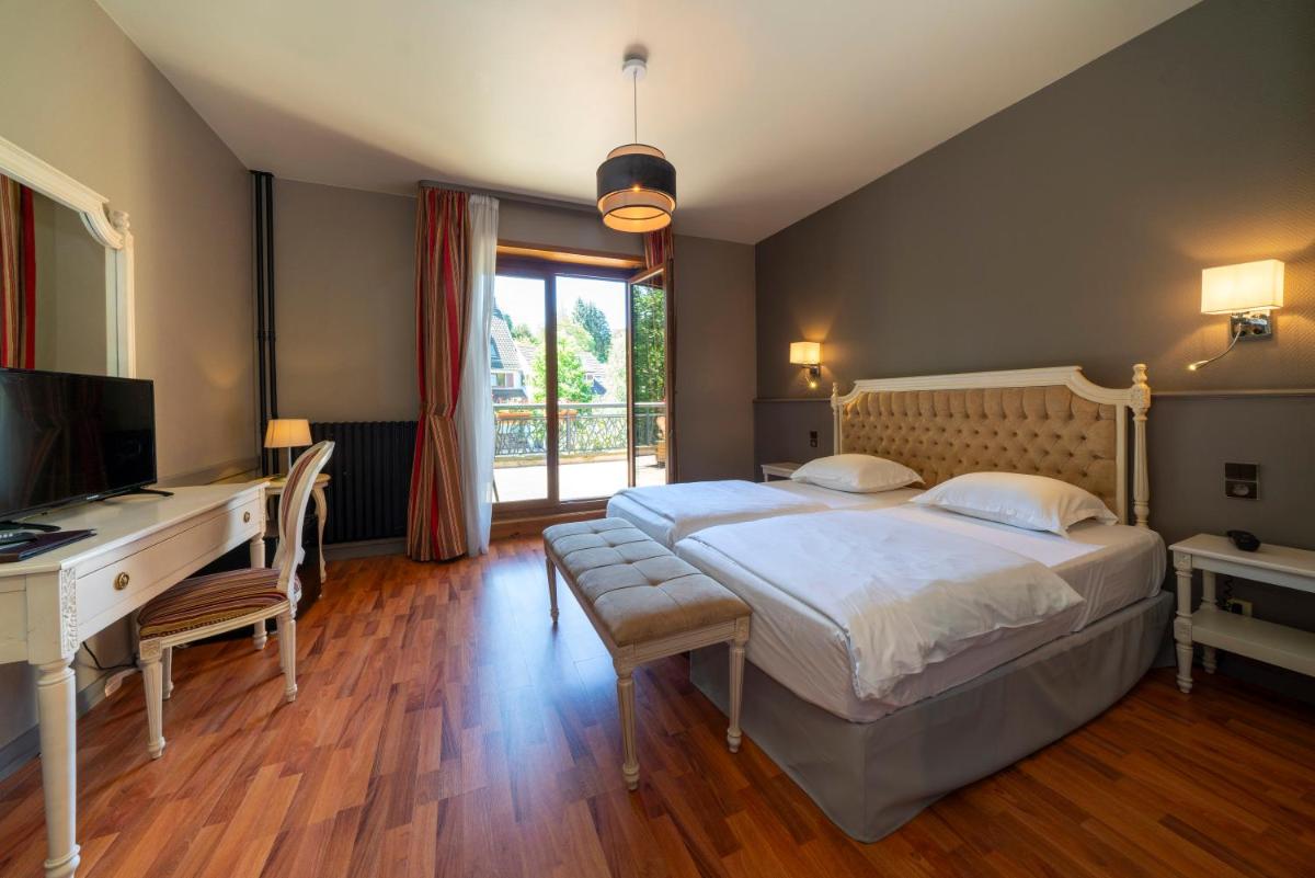 Un ou plusieurs lits dans un hébergement de l'établissement Hôtel du Parc, Restaurant, Spa & Wellness