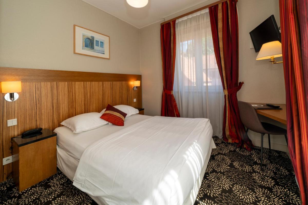 Un ou plusieurs lits dans un hébergement de l'établissement Hôtel du Parc, Restaurant, Spa & Wellness