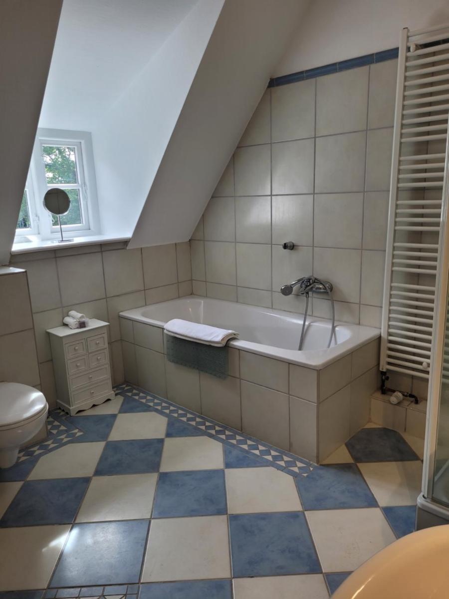 Ein Badezimmer in der Unterkunft Herrenhaus Borghorst