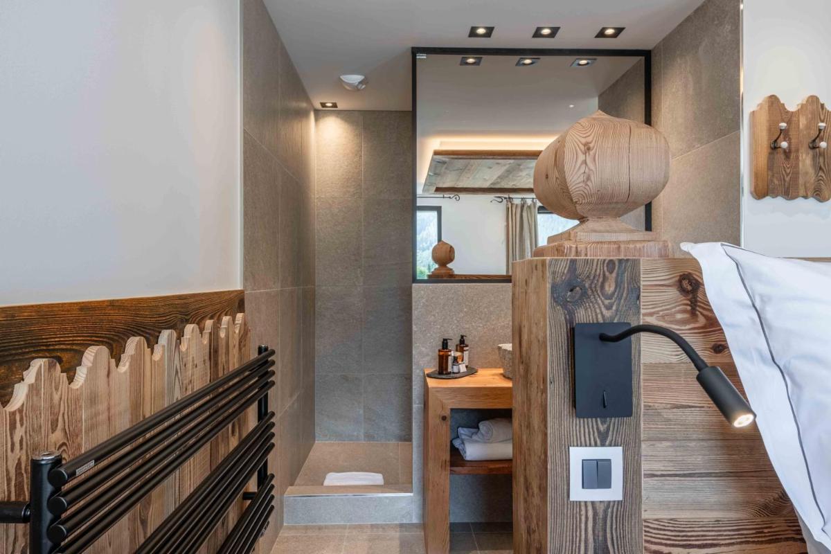 Un ou plusieurs lits dans un hébergement de l'établissement Chalet-Hôtel Hermitage