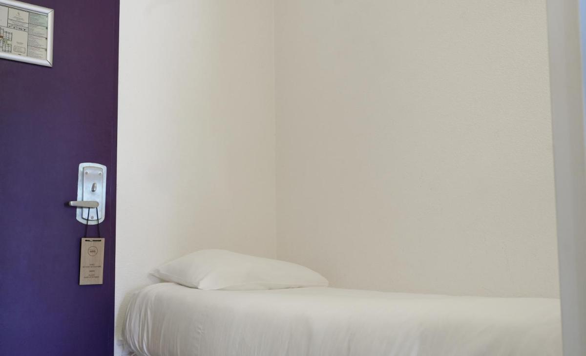 Un ou plusieurs lits dans un hébergement de l'établissement Thalazur Antibes - Résidence & Spa