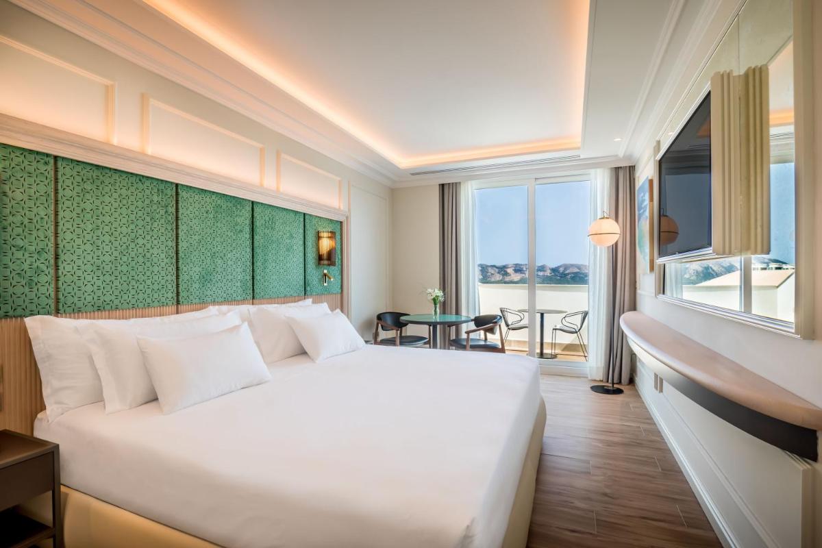 Cama o camas de una habitación en Barceló La Nucía Palms