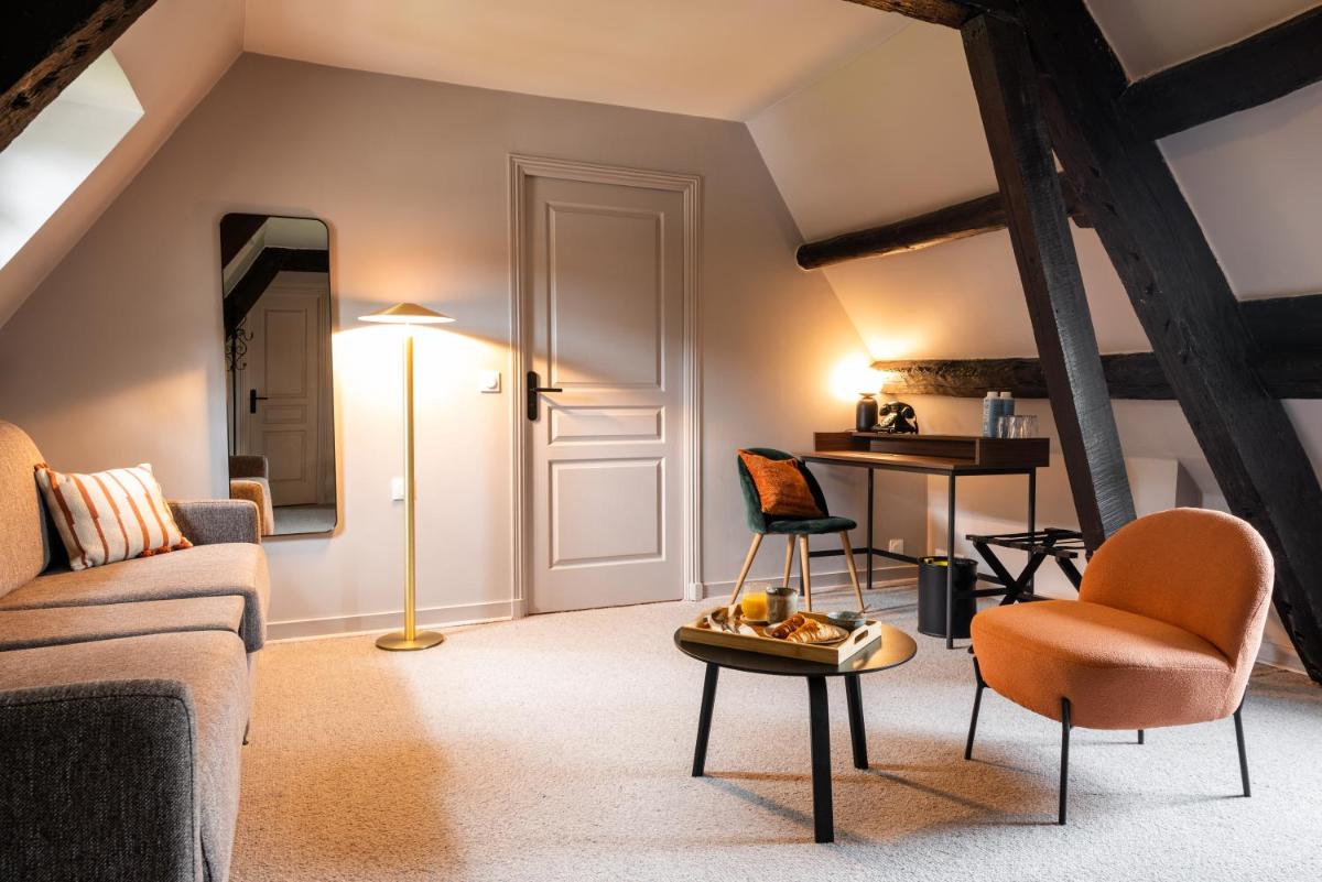 Coin salon dans l'établissement La Maison OBONO Hôtel & Spa
