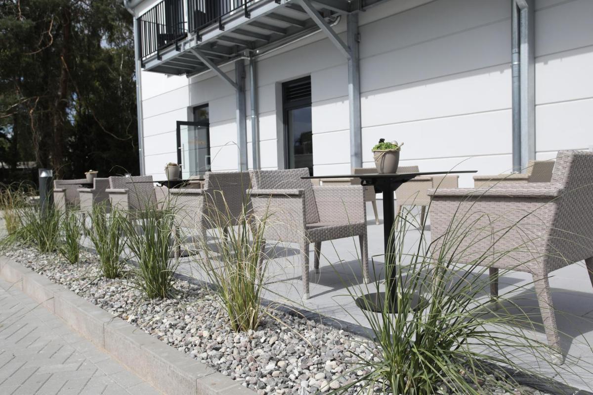 Sandbank Hotel & Appartements Lubmin - Housity