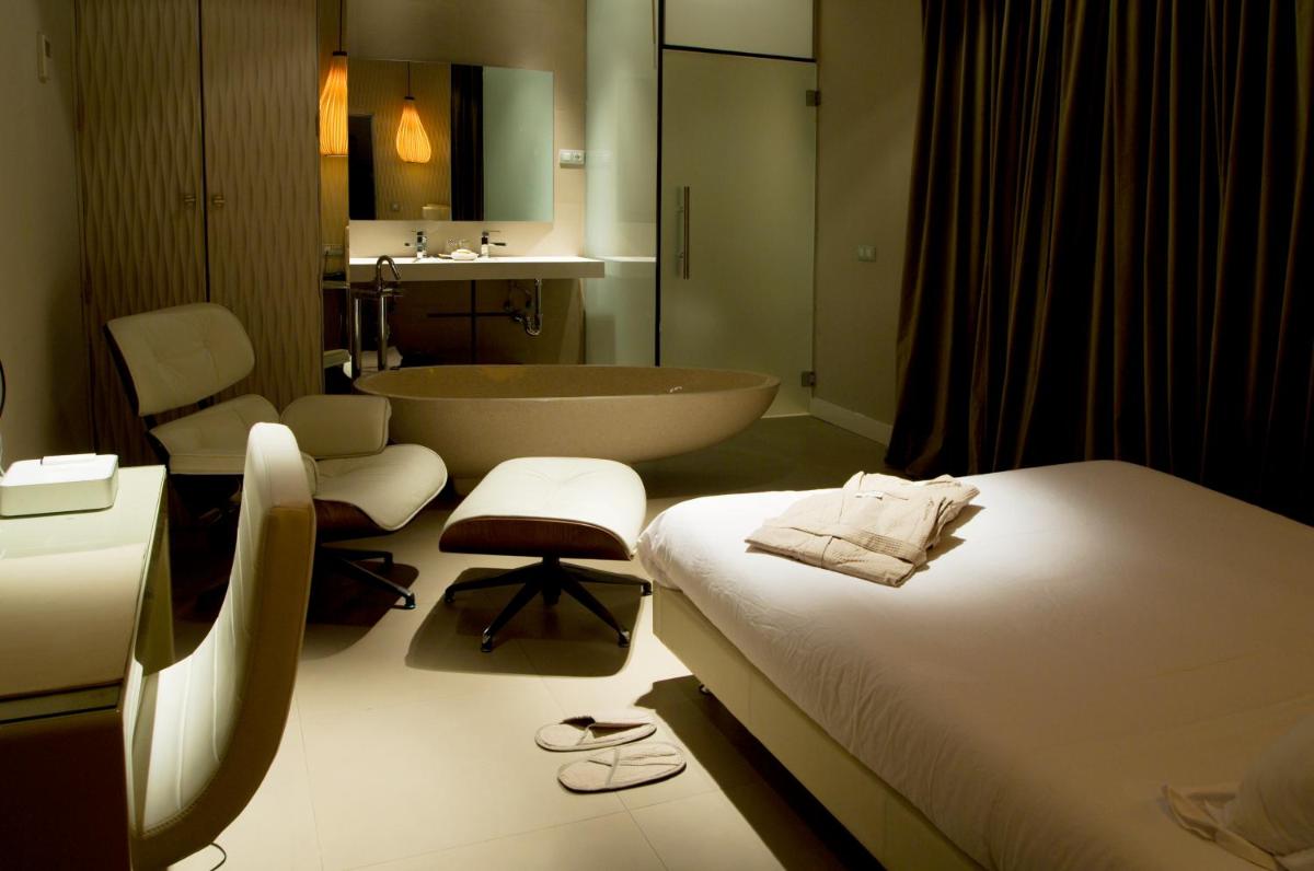 Cama o camas de una habitación en Abalú Design Boutique Hotel Gran Via