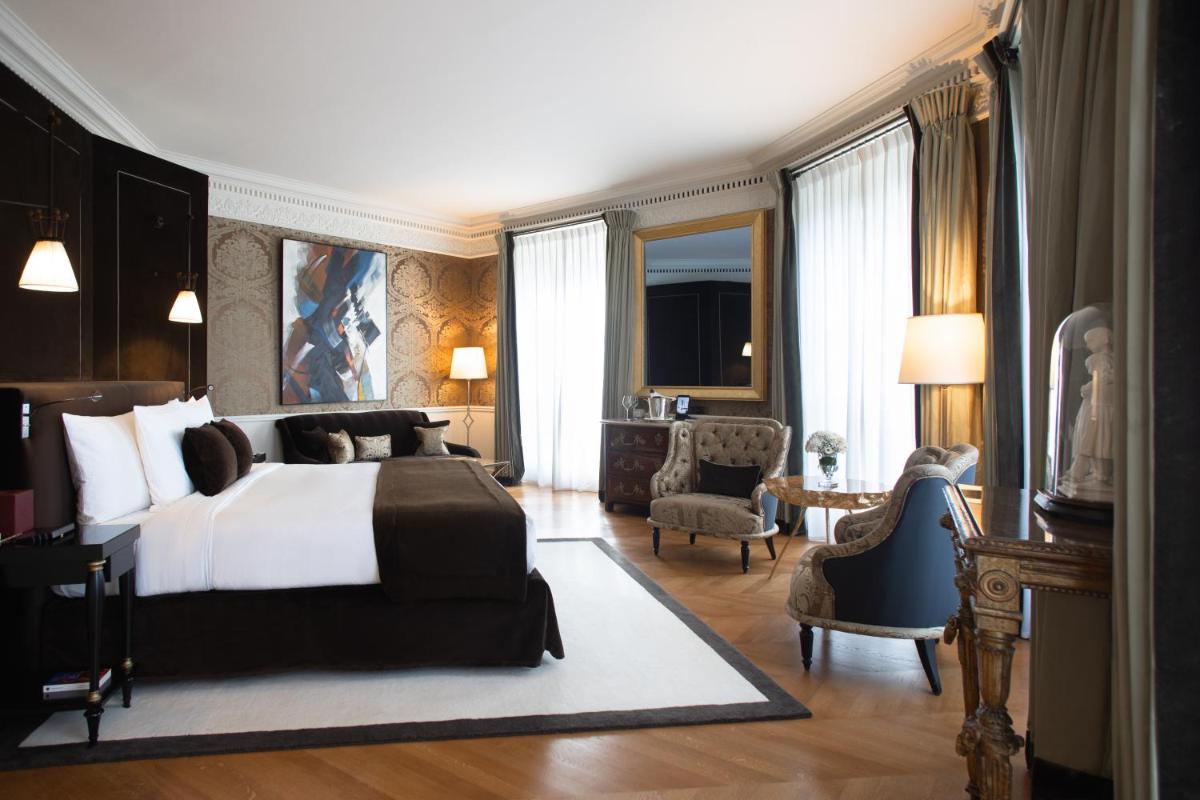 Un ou plusieurs lits dans un hébergement de l'établissement La Réserve Paris Hotel & Spa