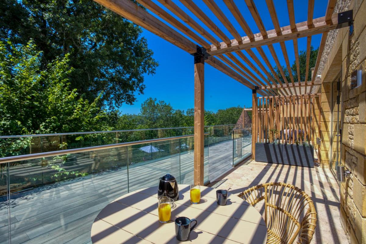 Balcon ou terrasse dans l'établissement La Perle de Domme