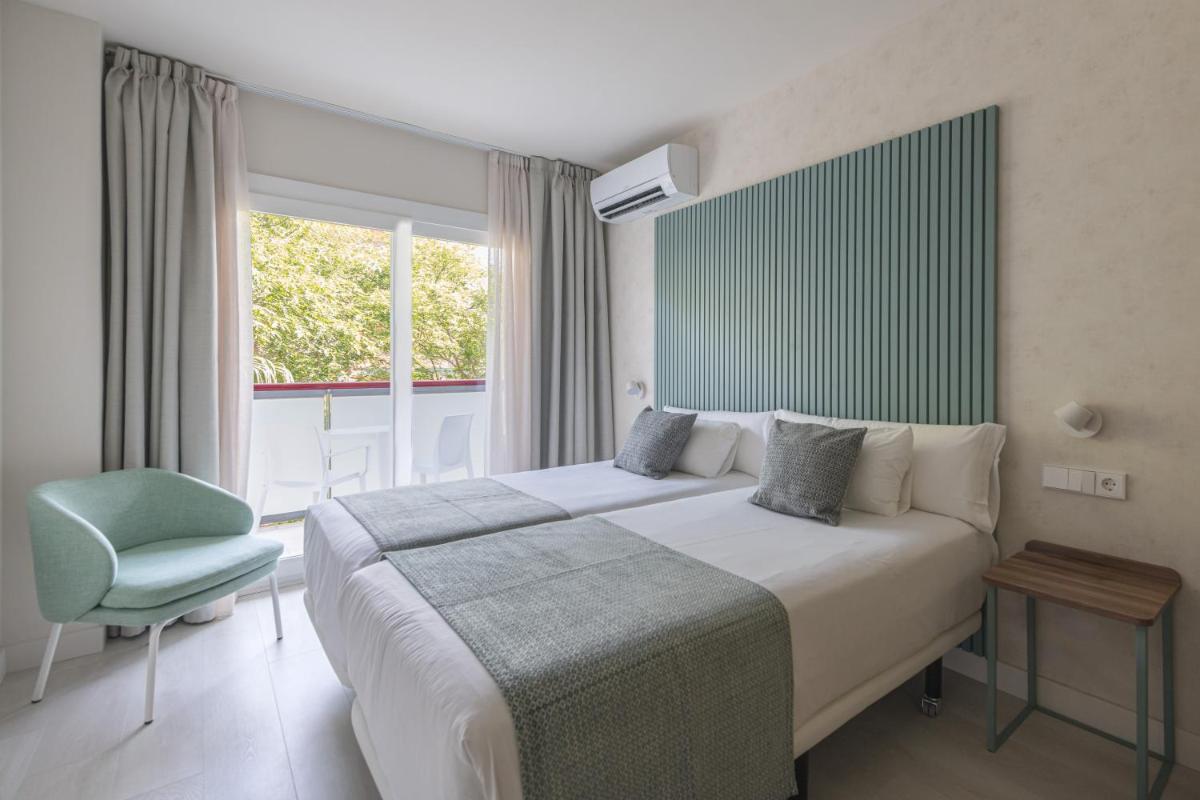 Cama o camas de una habitación en Eurosalou & Spa
