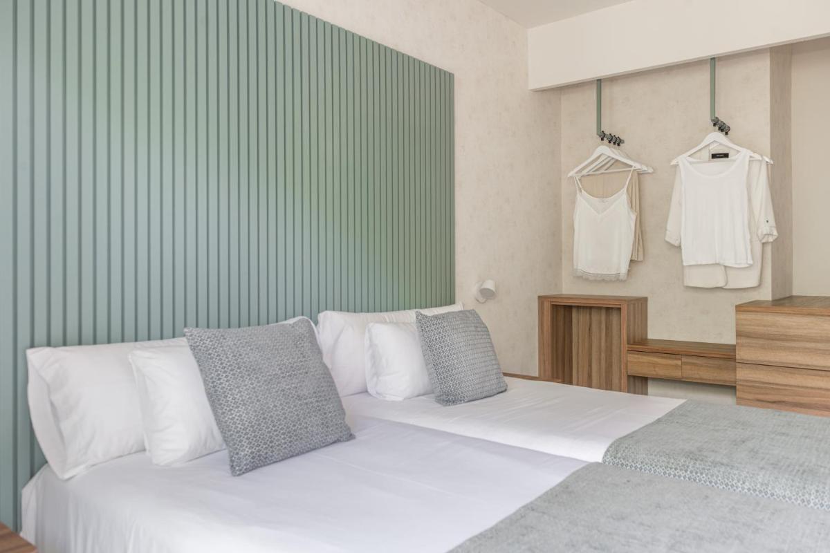 Cama o camas de una habitación en Eurosalou & Spa