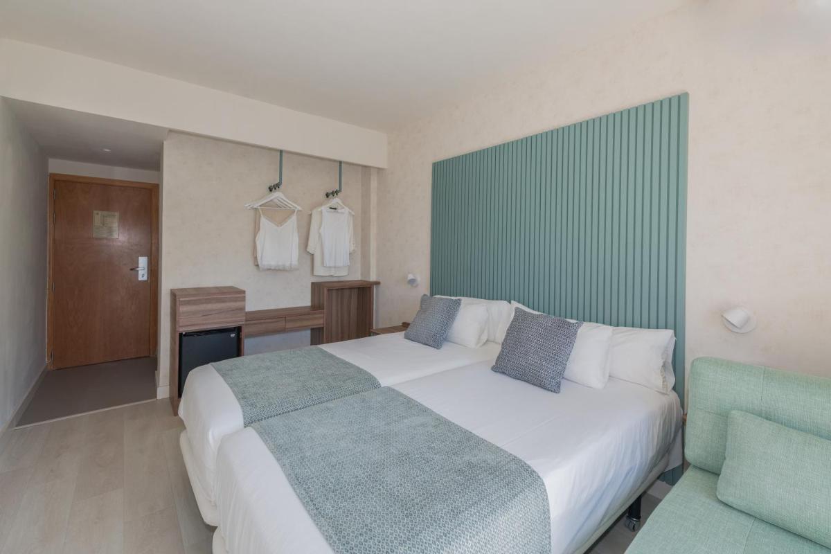 Cama o camas de una habitación en Eurosalou & Spa