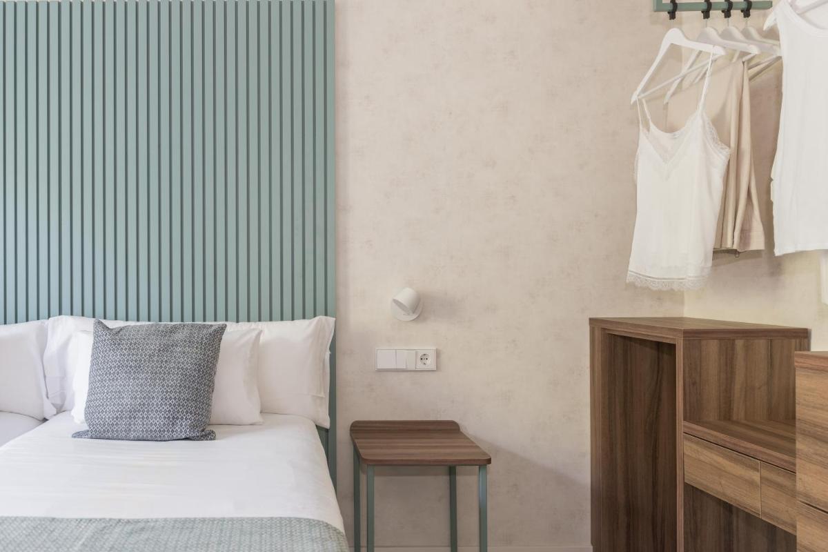 Cama o camas de una habitación en Eurosalou & Spa