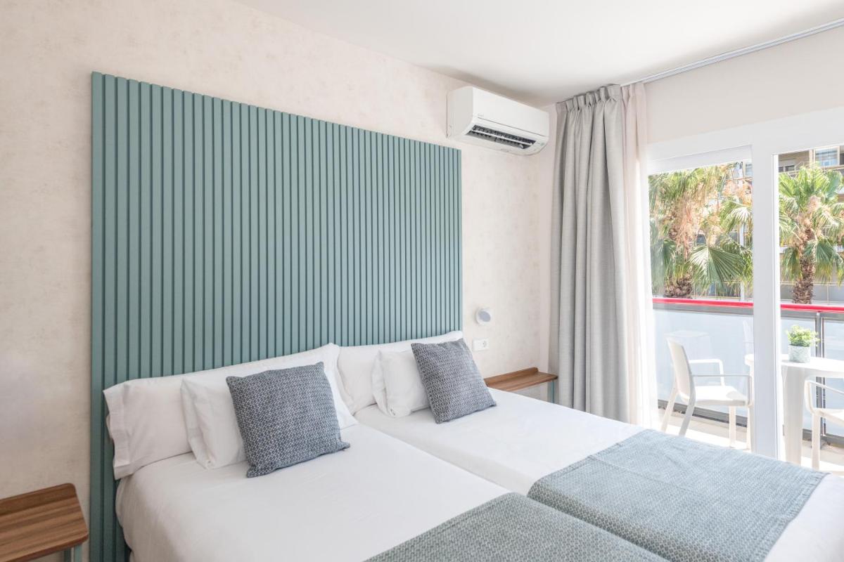 Cama o camas de una habitación en Eurosalou & Spa