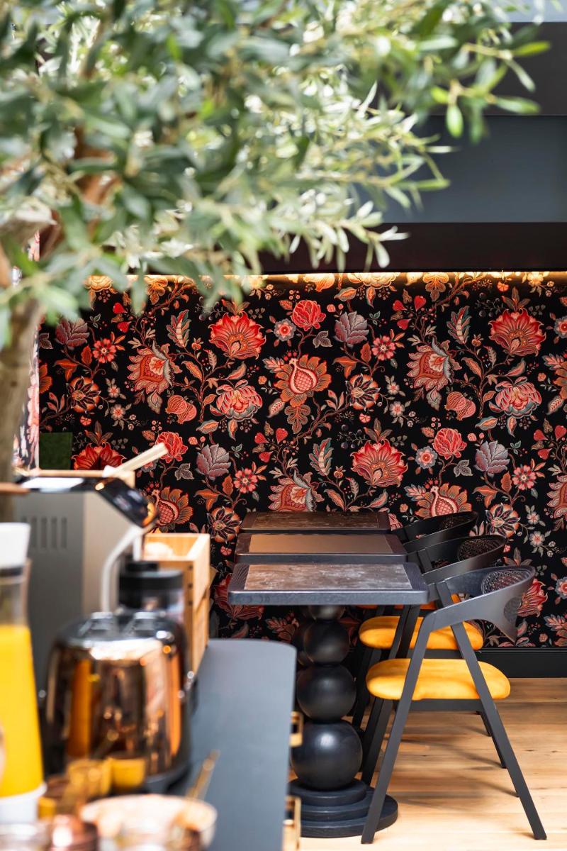 Coin salon dans l'établissement Hôtel Hiro Paris