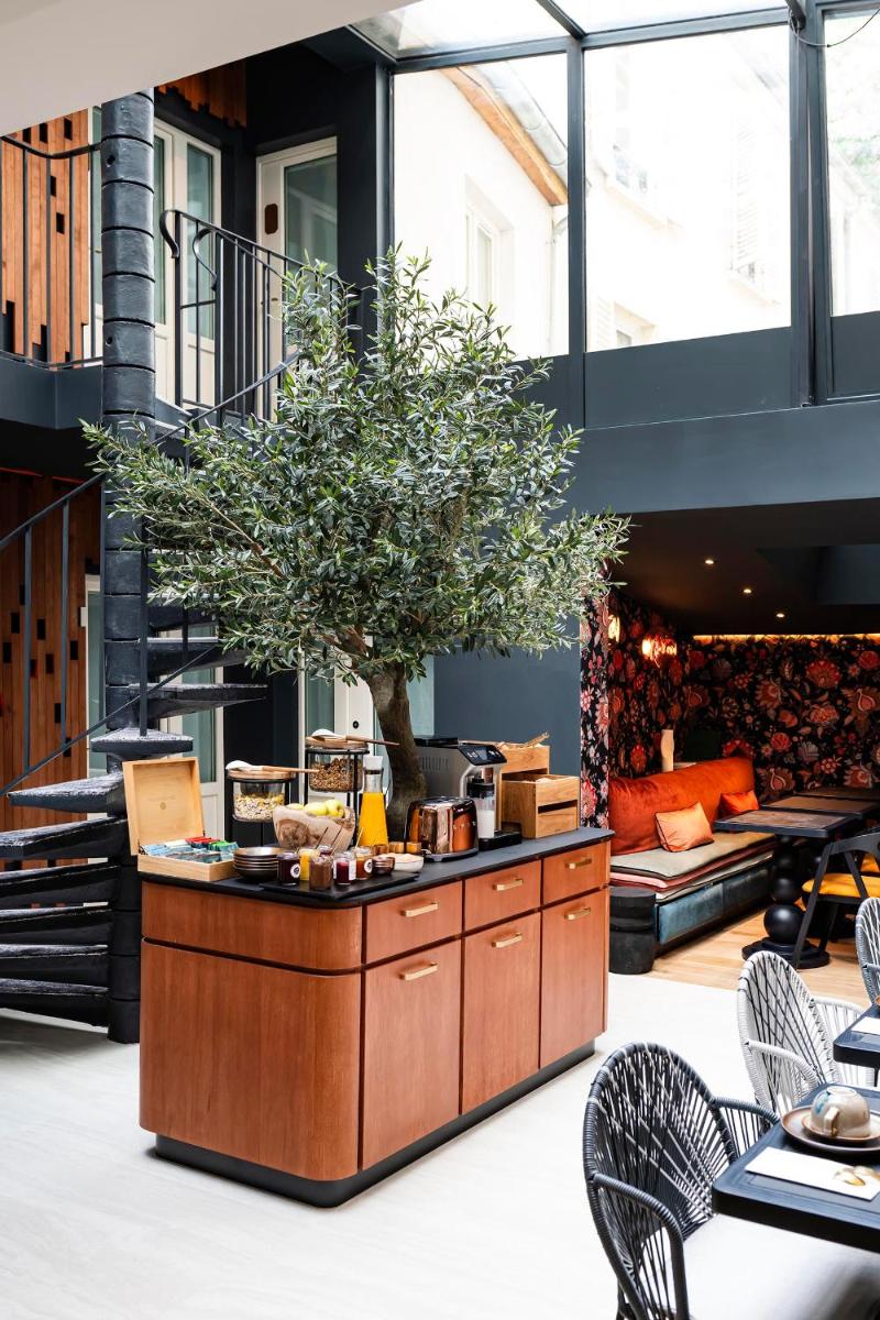 Coin salon dans l'établissement Hôtel Hiro Paris