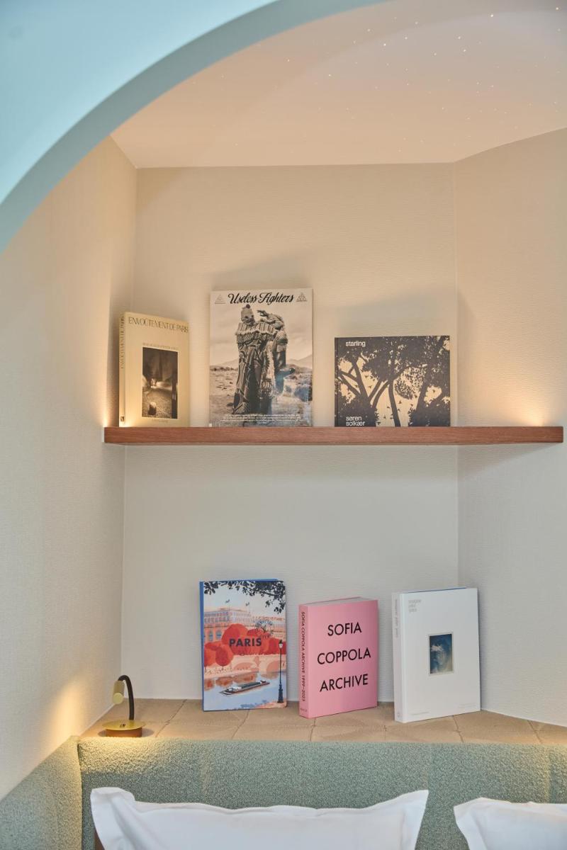 Coin salon dans l'établissement Hôtel Hiro Paris