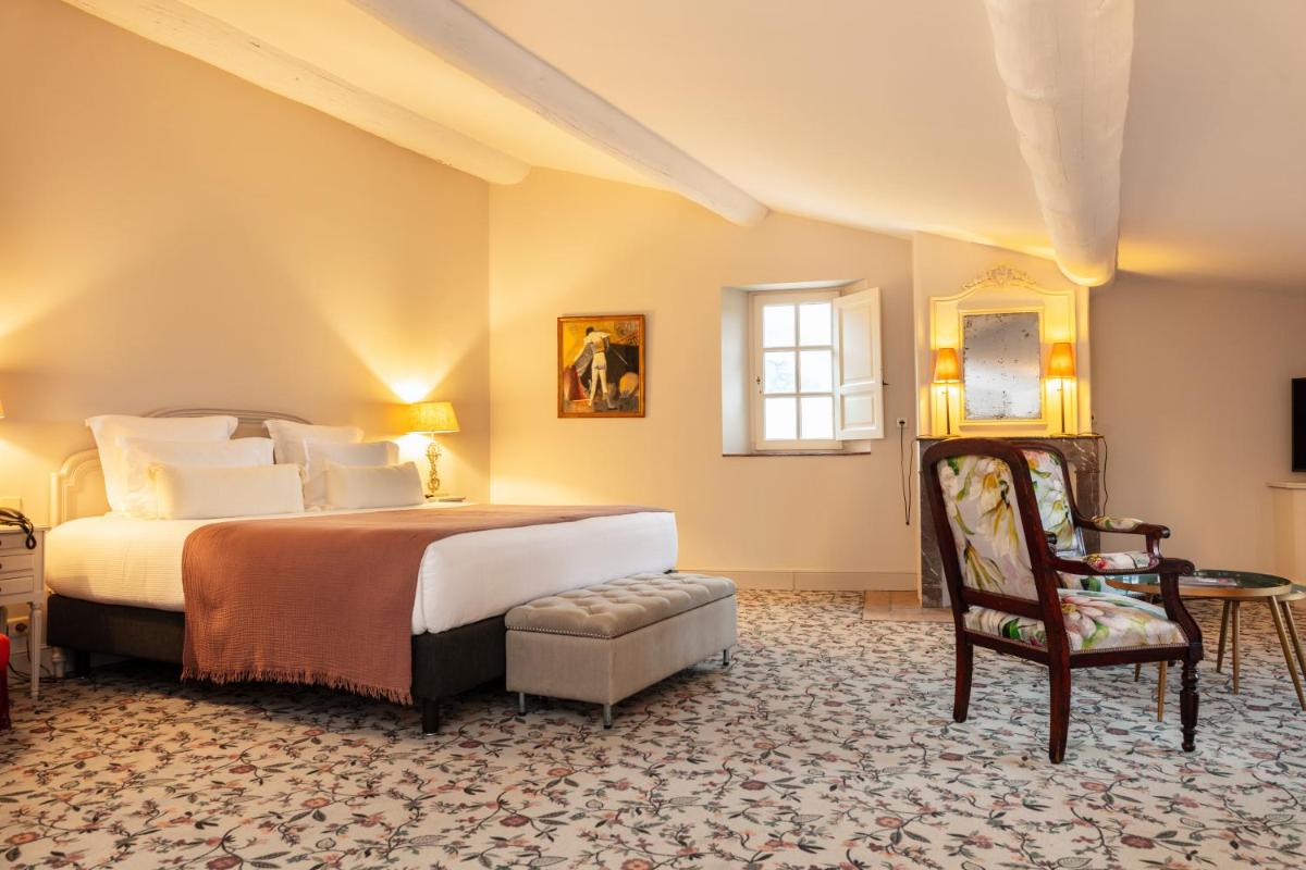 Un ou plusieurs lits dans un hébergement de l'établissement Hôtel - Restaurant & Spa La Magdeleine - Mathias Dandine