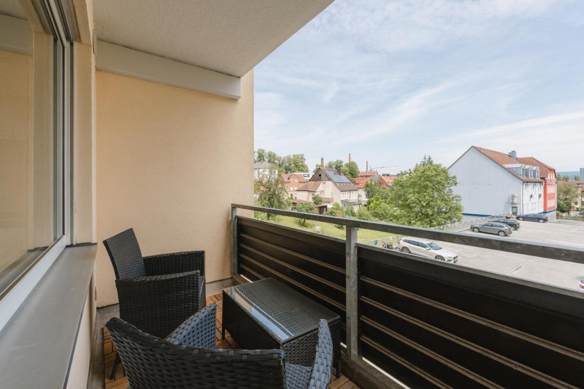 Exklusiv & Zentral: 1-Zi. Apartment mit Balkon Stellplatz - Housity