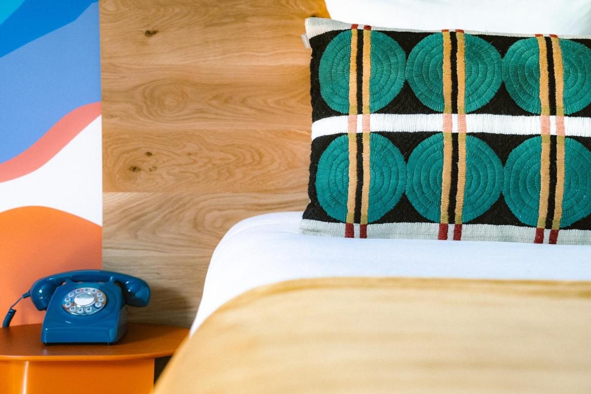 Un ou plusieurs lits dans un hébergement de l'établissement Big Sky Hotel & Spa