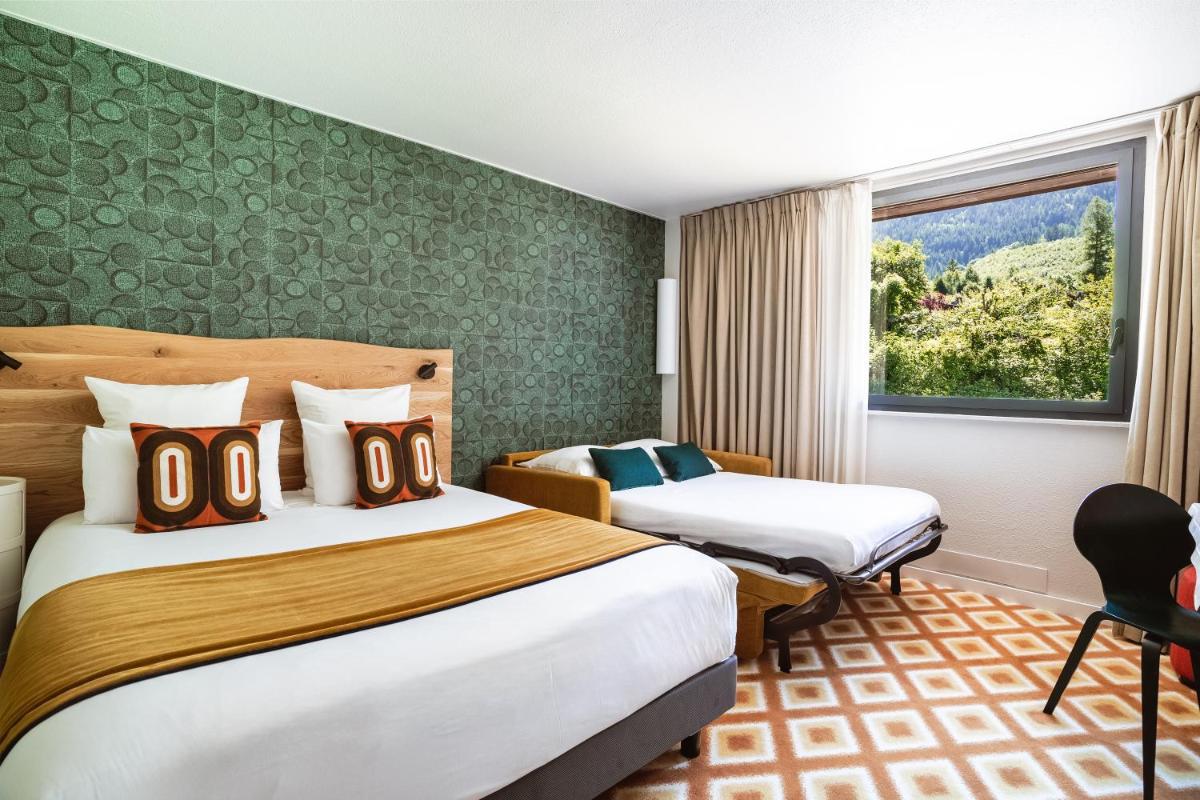 Un ou plusieurs lits dans un hébergement de l'établissement Big Sky Hotel & Spa