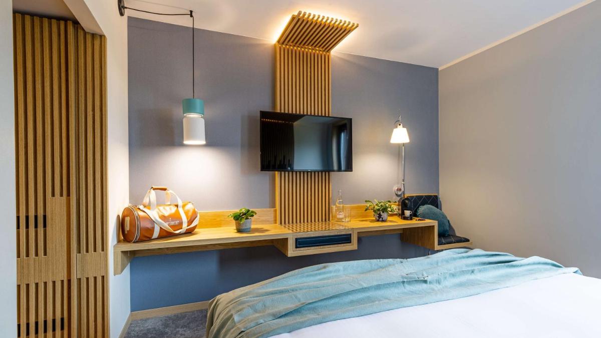 Un ou plusieurs lits dans un hébergement de l'établissement Domaine de Dolomieu Hotel & Spa - BW Premier Collection