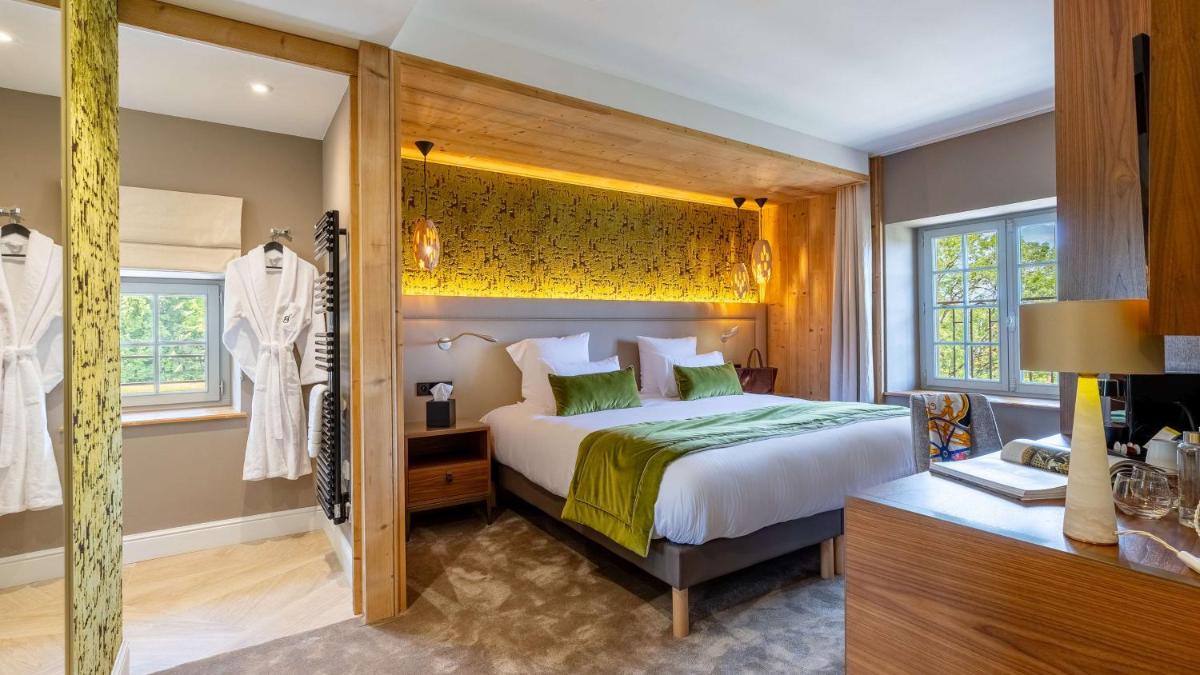 Un ou plusieurs lits dans un hébergement de l'établissement Domaine de Dolomieu Hotel & Spa - BW Premier Collection