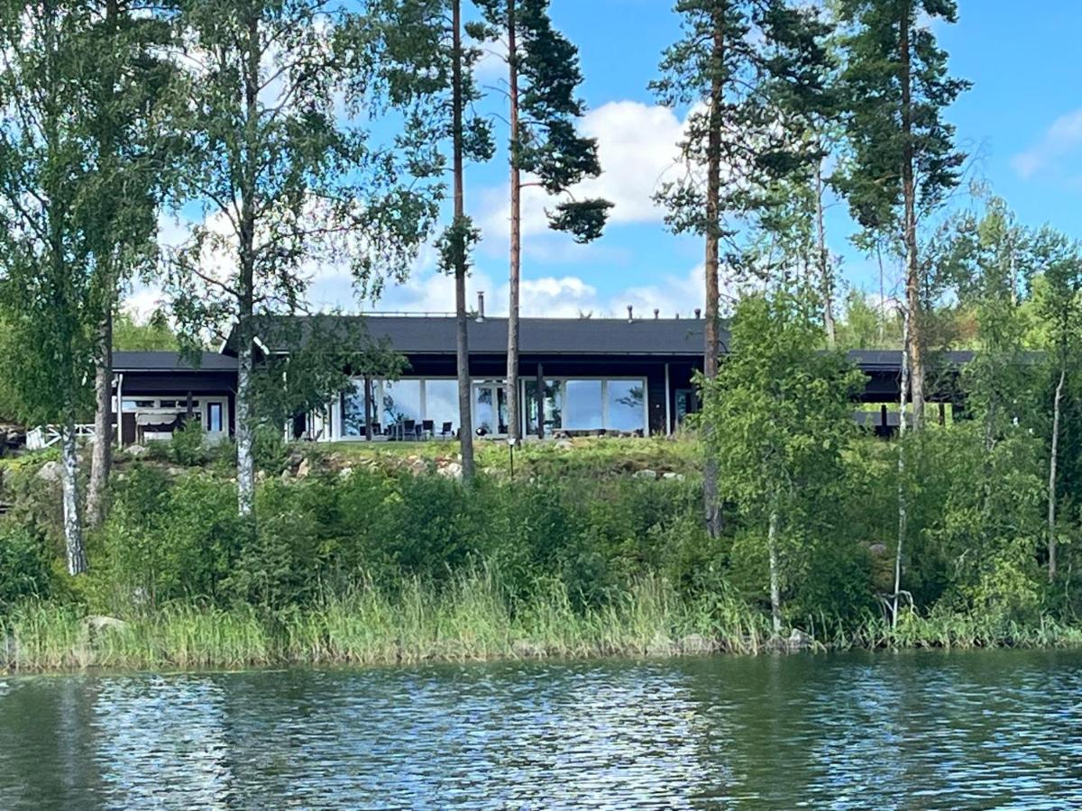 SleepWell Villa Hartola by the lake - Housity