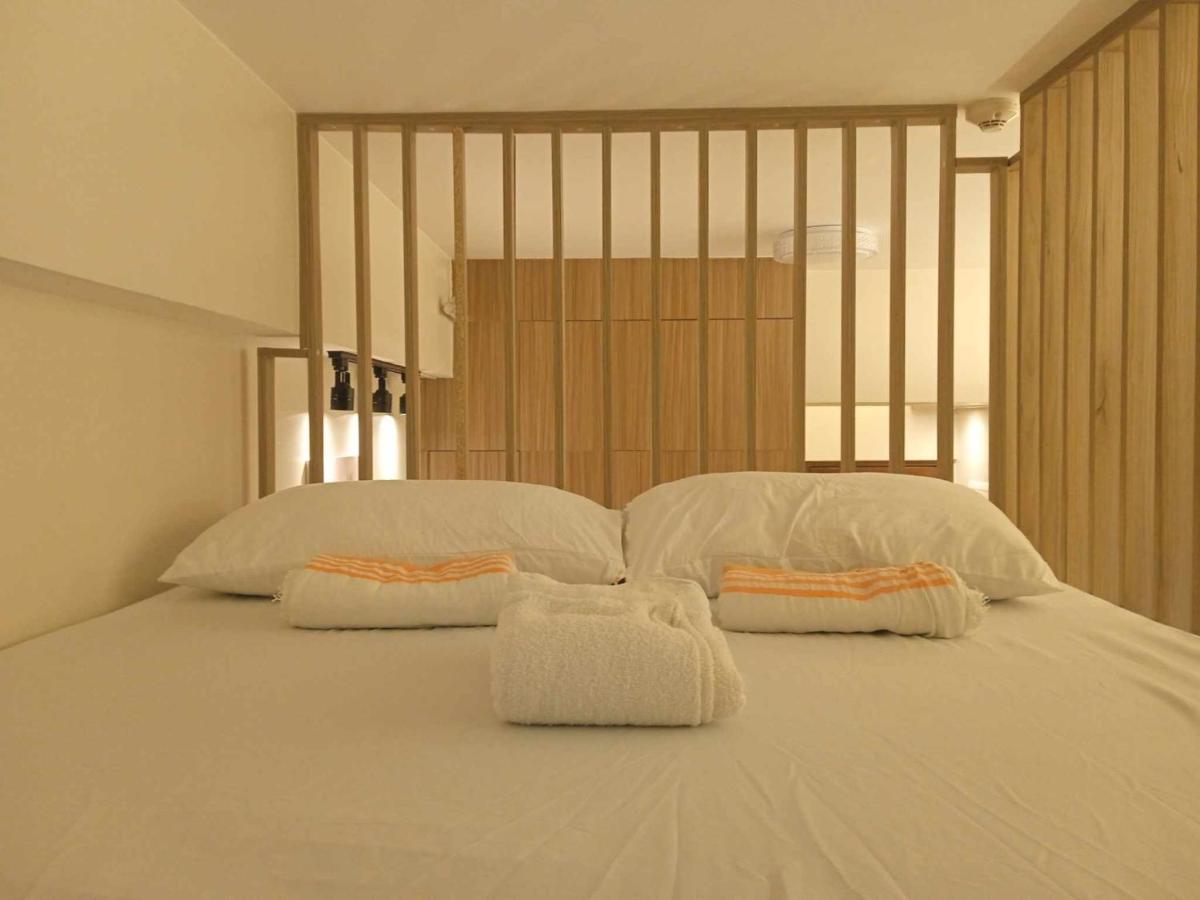 Nordic Rsquare Manila - with Pool Access - Housity