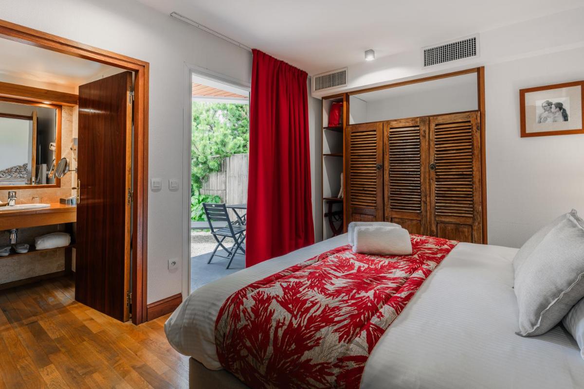 Un ou plusieurs lits dans un hébergement de l'établissement Villa Kerasy Hotel Spa