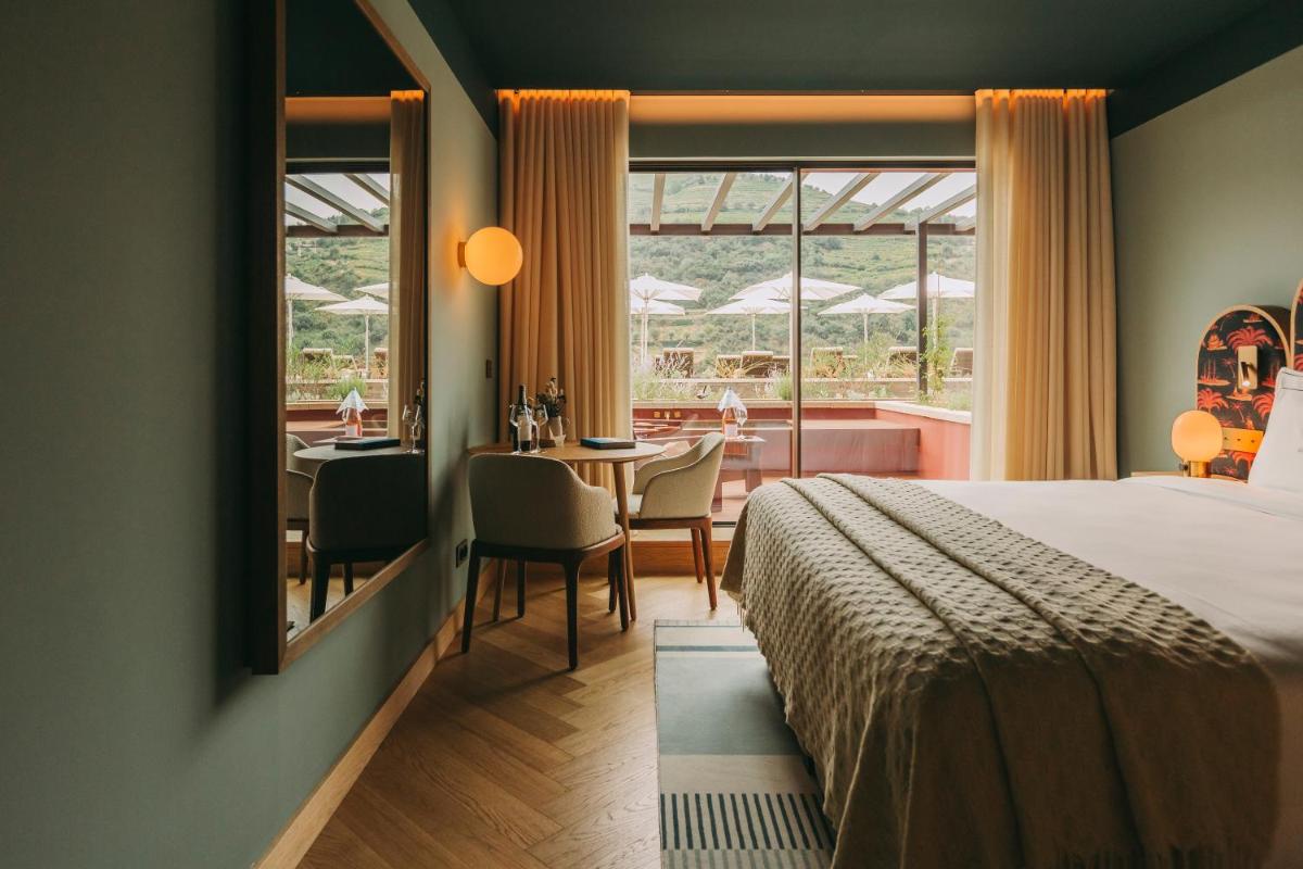 Uma cama ou camas num quarto em Torel Quinta da Vacaria - Douro Valley