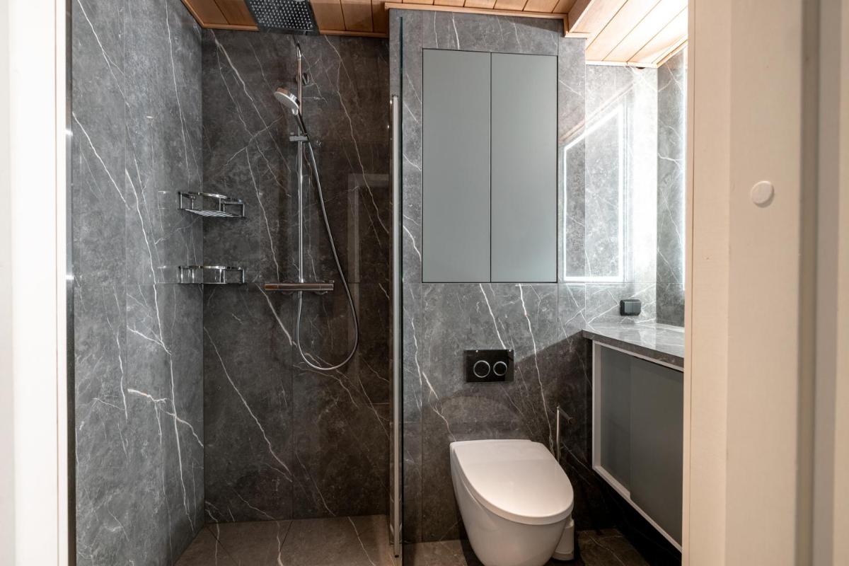 2ndhomes Modern 1BR Home with Sauna and Balcony in Bulevardi - Housity