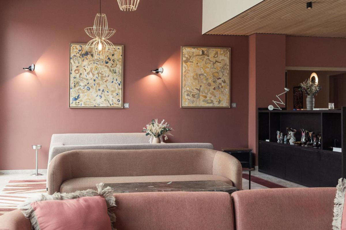 Coin salon dans l'établissement voco Beaune , Cité des Vins by IHG