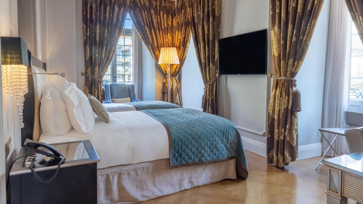 Uma cama ou camas num quarto em InterContinental Porto - Palacio das Cardosas by IHG