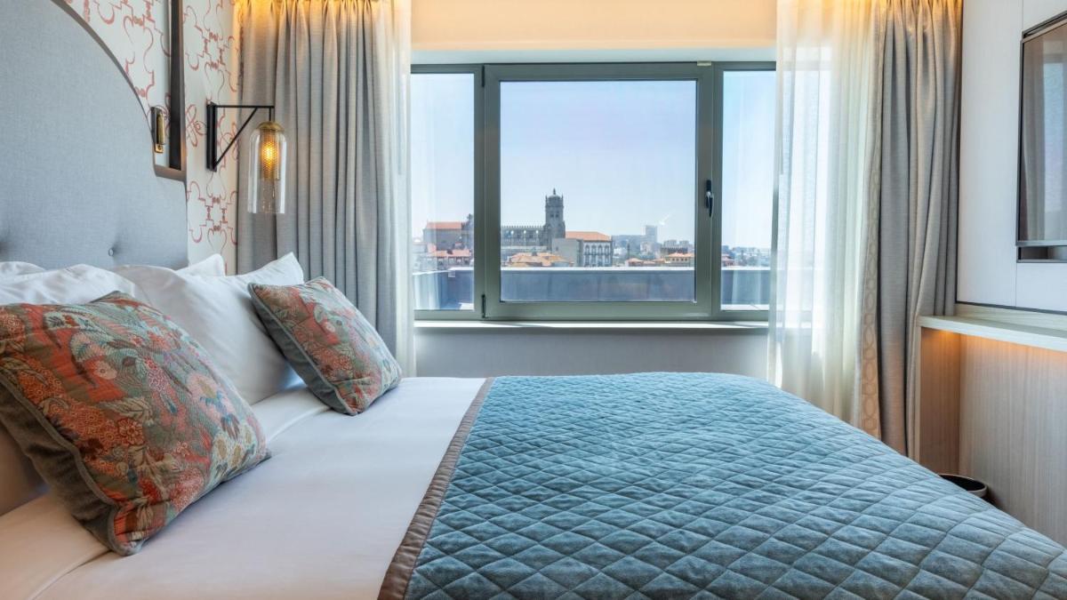 Uma cama ou camas num quarto em InterContinental Porto - Palacio das Cardosas by IHG