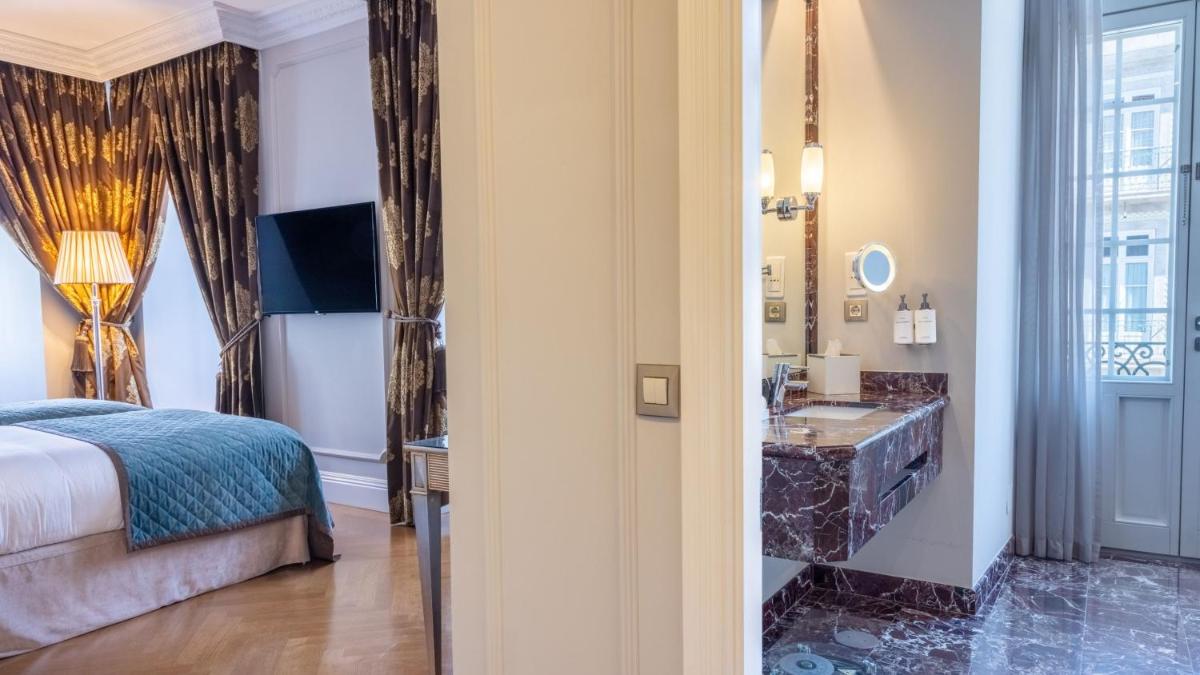 Uma cama ou camas num quarto em InterContinental Porto - Palacio das Cardosas by IHG
