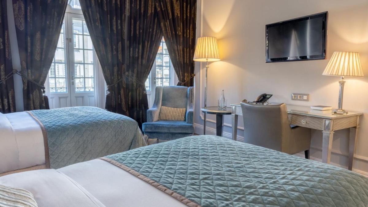 Uma cama ou camas num quarto em InterContinental Porto - Palacio das Cardosas by IHG
