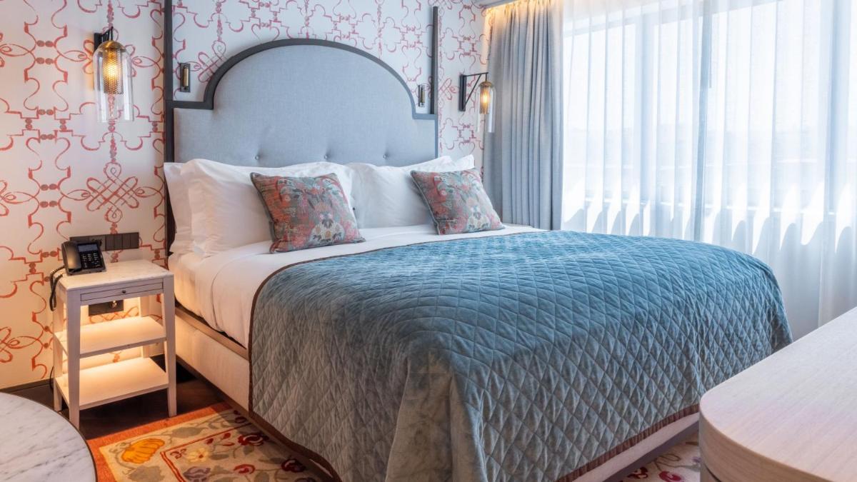 Uma cama ou camas num quarto em InterContinental Porto - Palacio das Cardosas by IHG