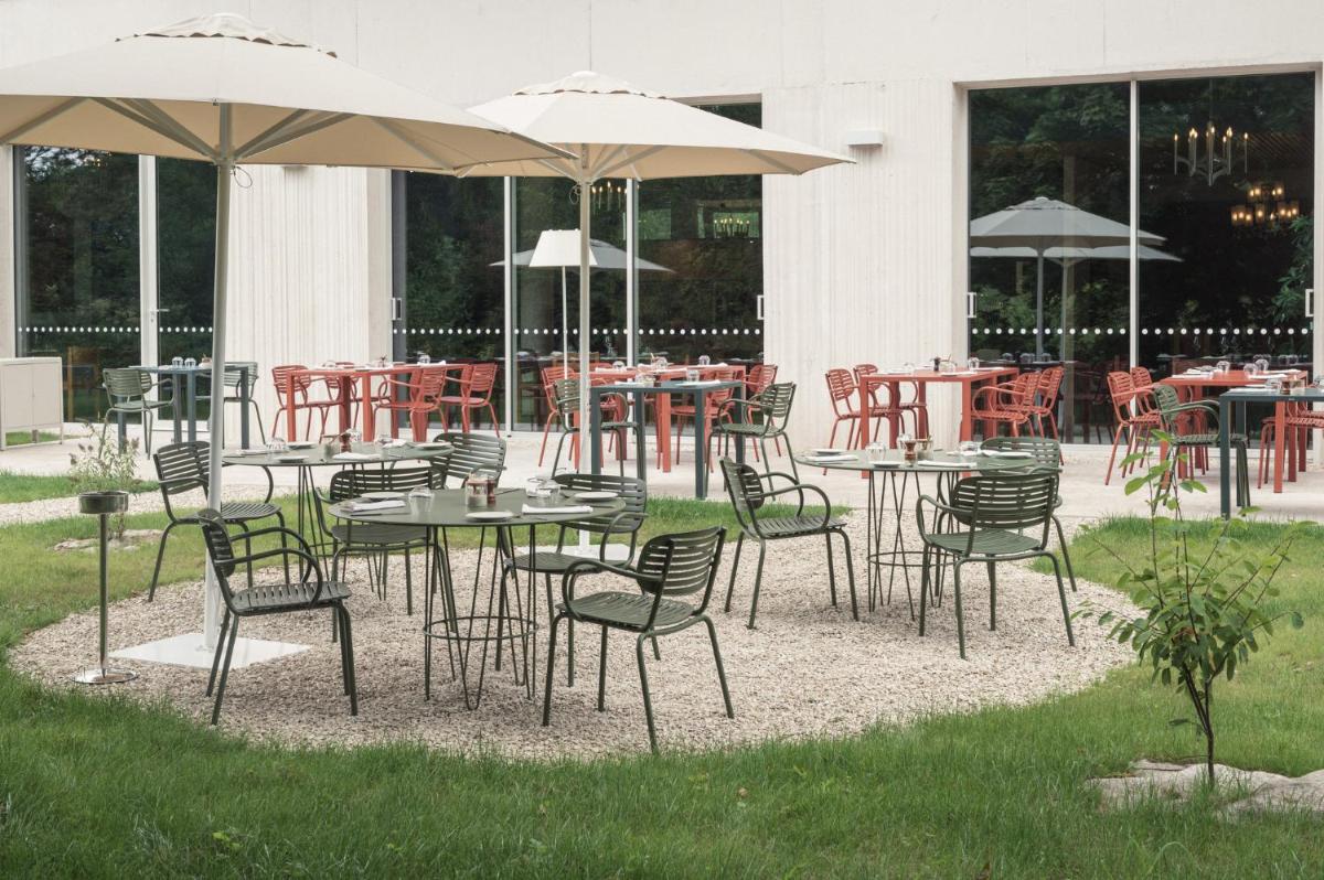 Restaurant ou autre lieu de restauration dans l'établissement voco Beaune , Cité des Vins by IHG