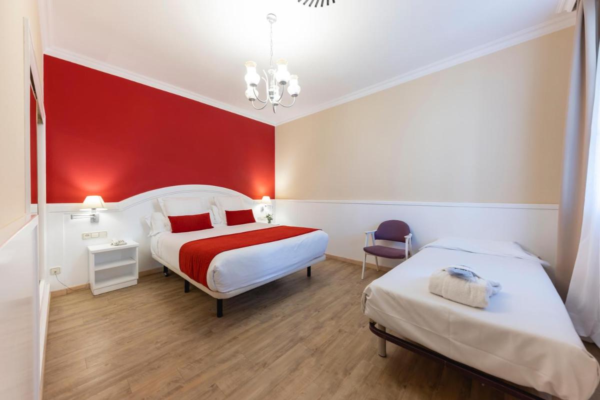Cama o camas de una habitación en 1881 Hotel Balneario Vichy Catalan