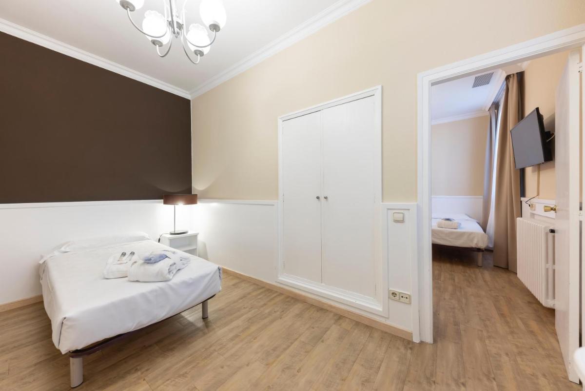 Cama o camas de una habitación en 1881 Hotel Balneario Vichy Catalan