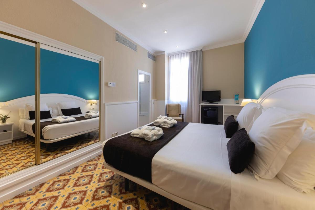 Cama o camas de una habitación en 1881 Hotel Balneario Vichy Catalan