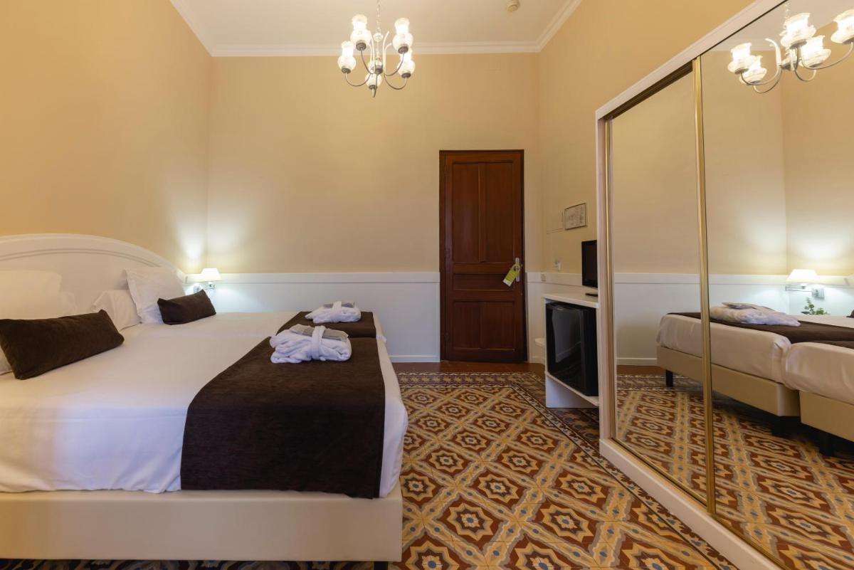 Cama o camas de una habitación en 1881 Hotel Balneario Vichy Catalan