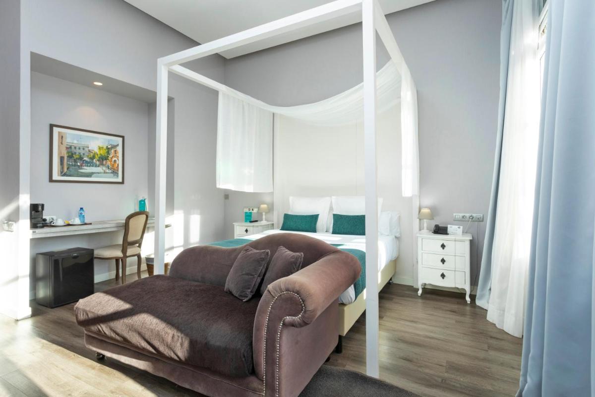 Cama o camas de una habitación en 1881 Hotel Balneario Vichy Catalan