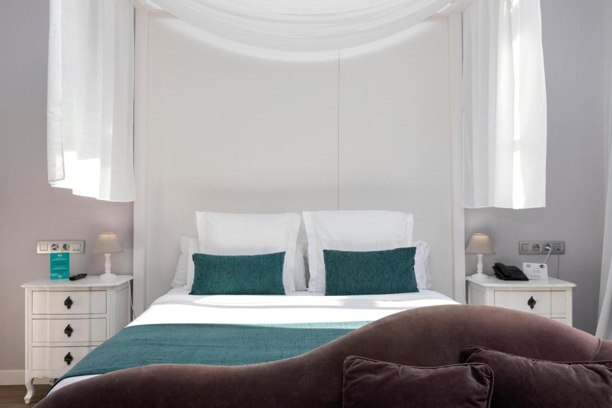 Cama o camas de una habitación en 1881 Hotel Balneario Vichy Catalan