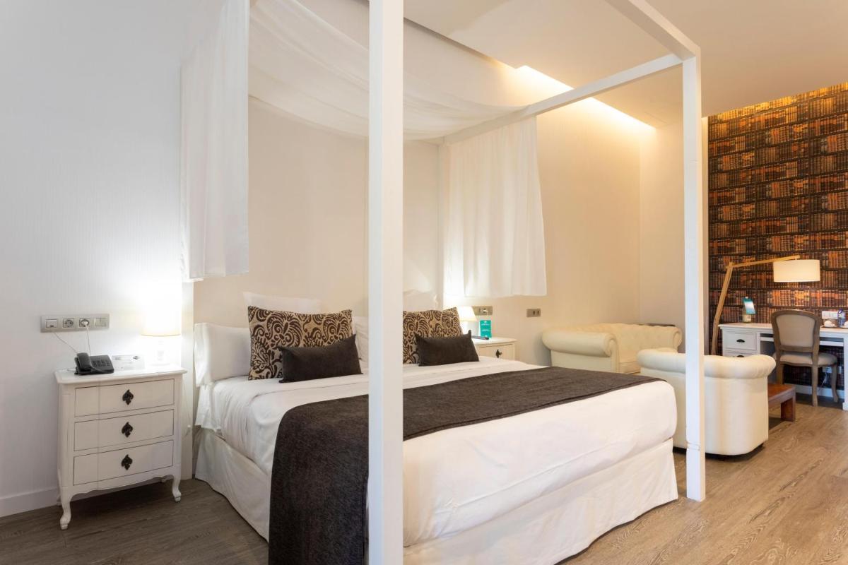 Cama o camas de una habitación en 1881 Hotel Balneario Vichy Catalan