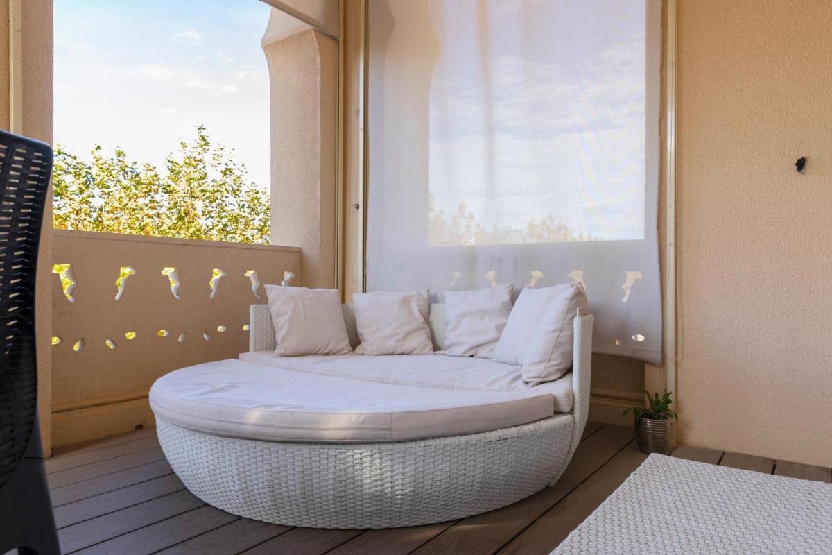Cama o camas de una habitación en 1881 Hotel Balneario Vichy Catalan