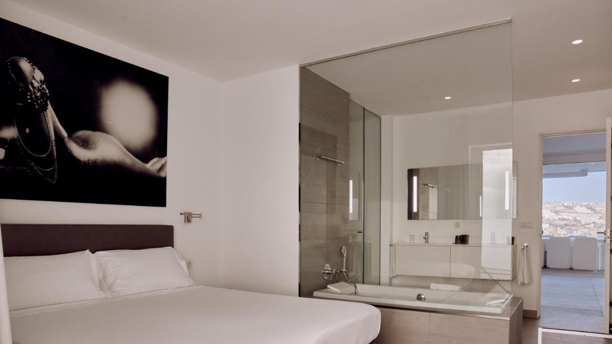 Un baño de Hotel Baobab Suites