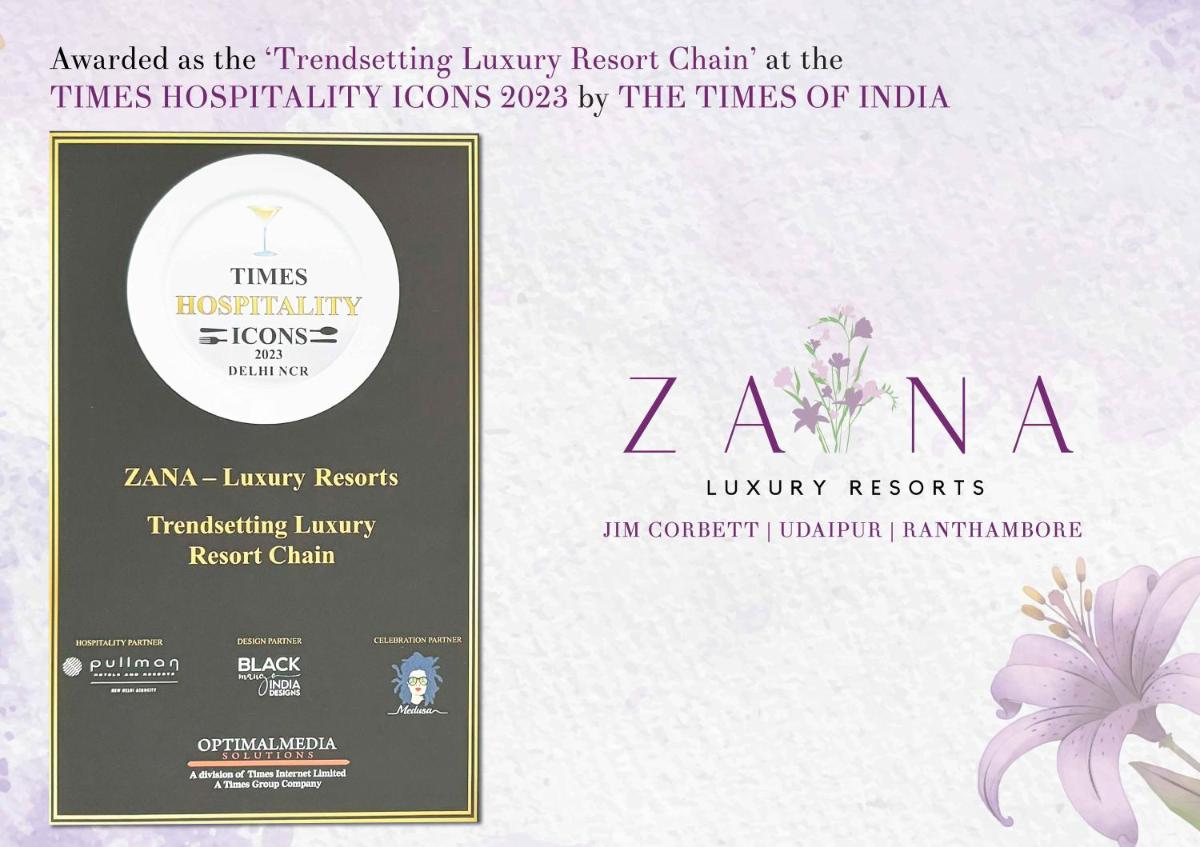 a label for a zaan luxury resort chain with a flower at ZANA Lakeview Resort - most scenic lakeside resort in Udaipur