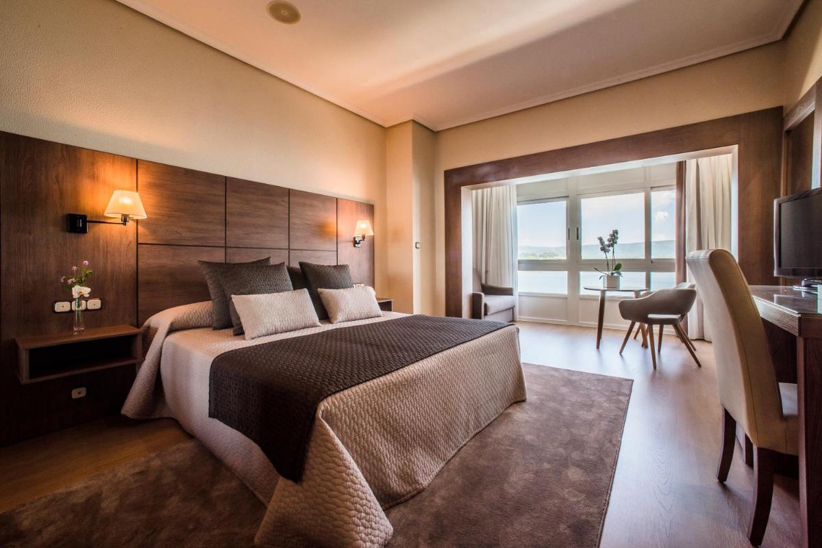 Cama o camas de una habitación en Eurostars Louxo Talaso