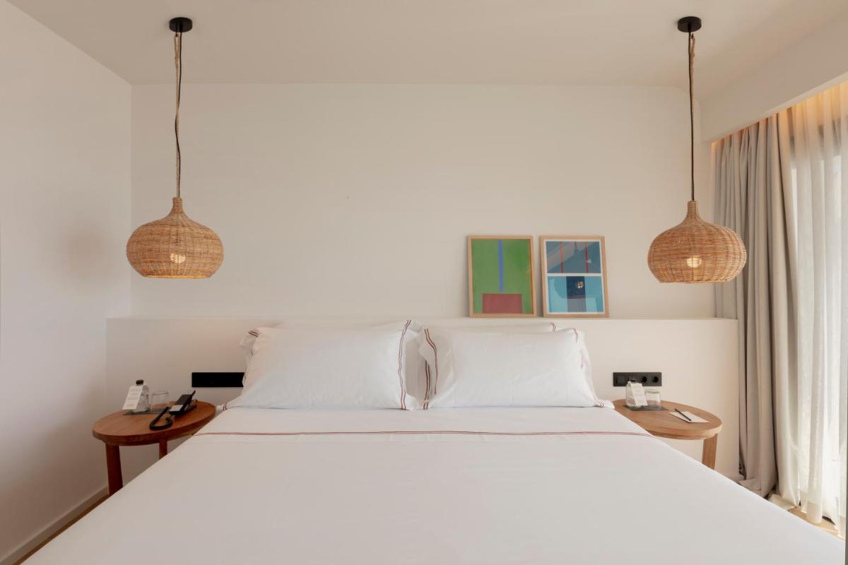 Cama o camas de una habitación en Elisabeth by the Sea Hotel